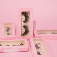 Lash Lovers 3D faux mink lash bundle displayed in stylish packaging on a pink background.