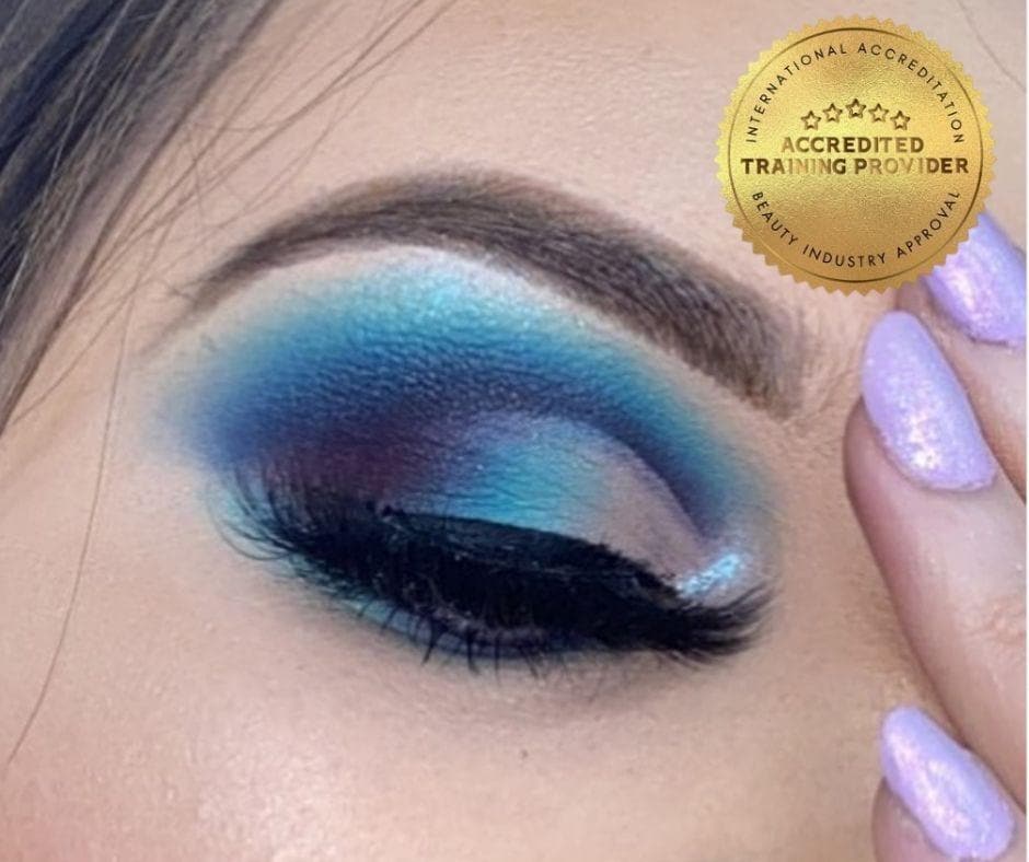 Beautiful makeup look featuring blue and purple eyeshadow, showcasing skills from the Makeup Mastery course.